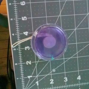 Purple plastic yoyo